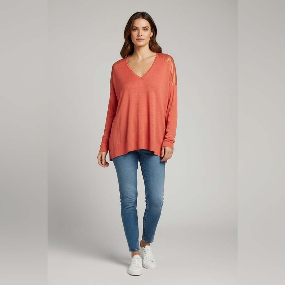 Guess Coral top with sheer shoulder details.